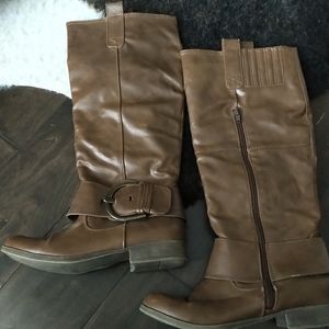 Tall brown boots with buckle